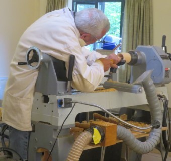 Ken working on a music box